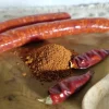 épices à merguez avec quelques merguez